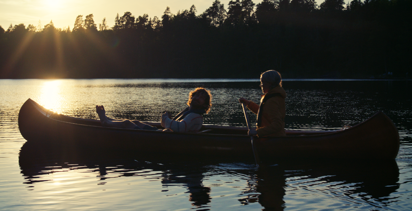 A couple in a canoe at sunset on a lake in Sweden for Electrolux campaign with Publicis London. 
