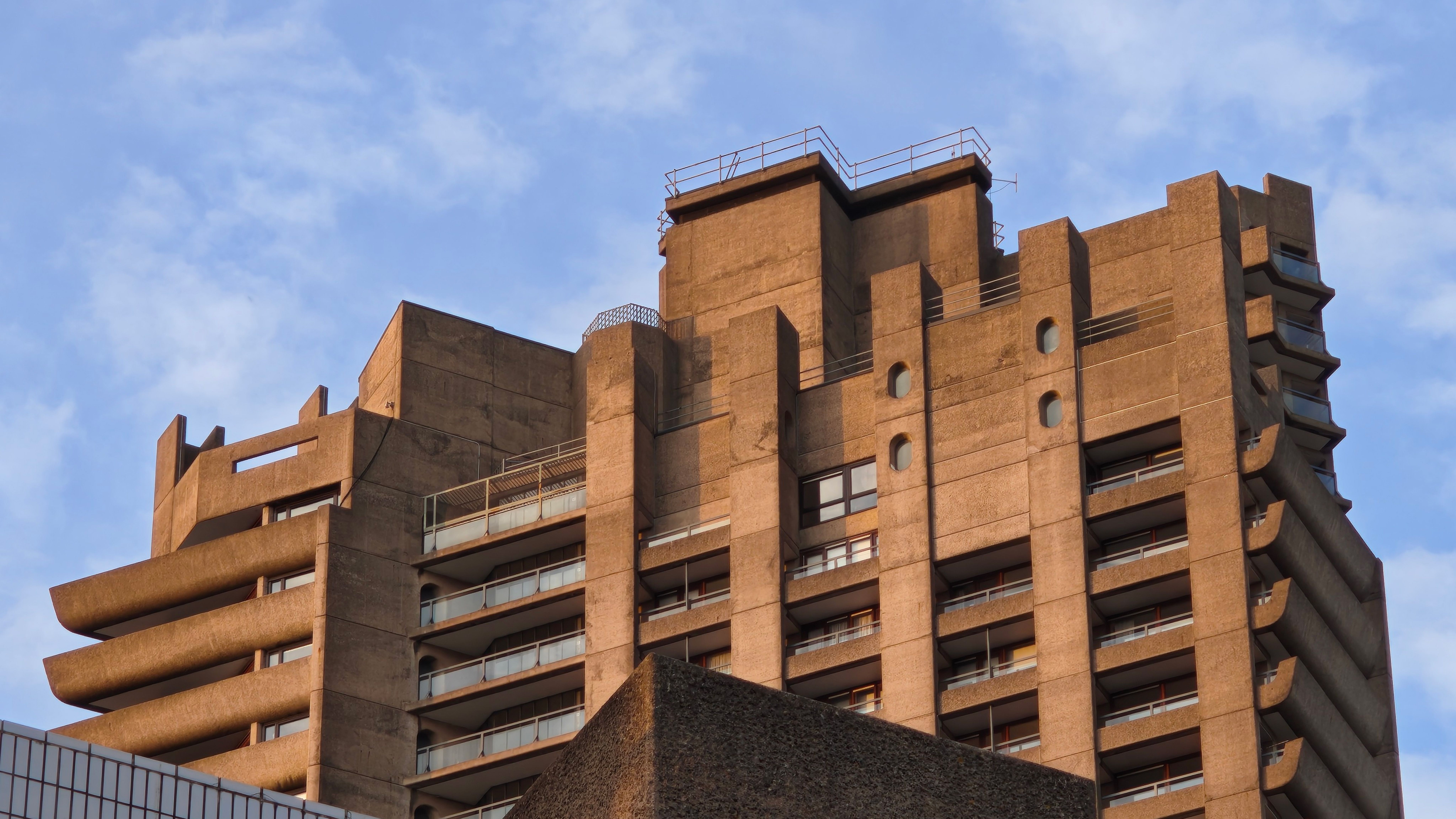 Sample photo from Nothing Phone (3) camera showing sharp detail of Brutalist building against blue sky.