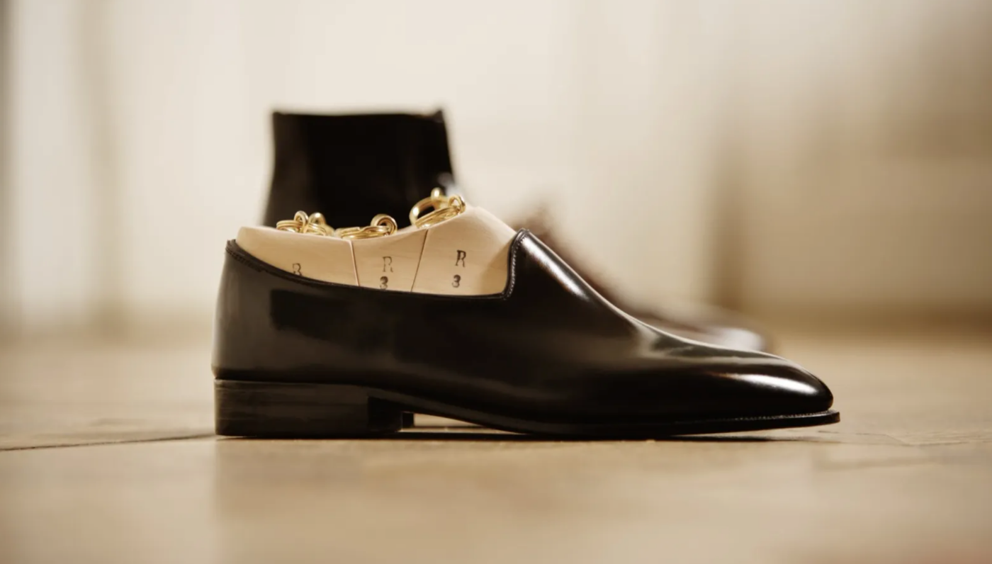 Rudolf Scheer & Söhne side on close up of a black slip on bespoke shoe.