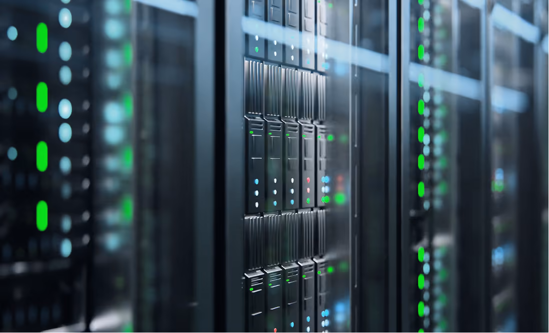 Close-up view of server rack units with blinking green, blue, and red indicator lights in a data center.
