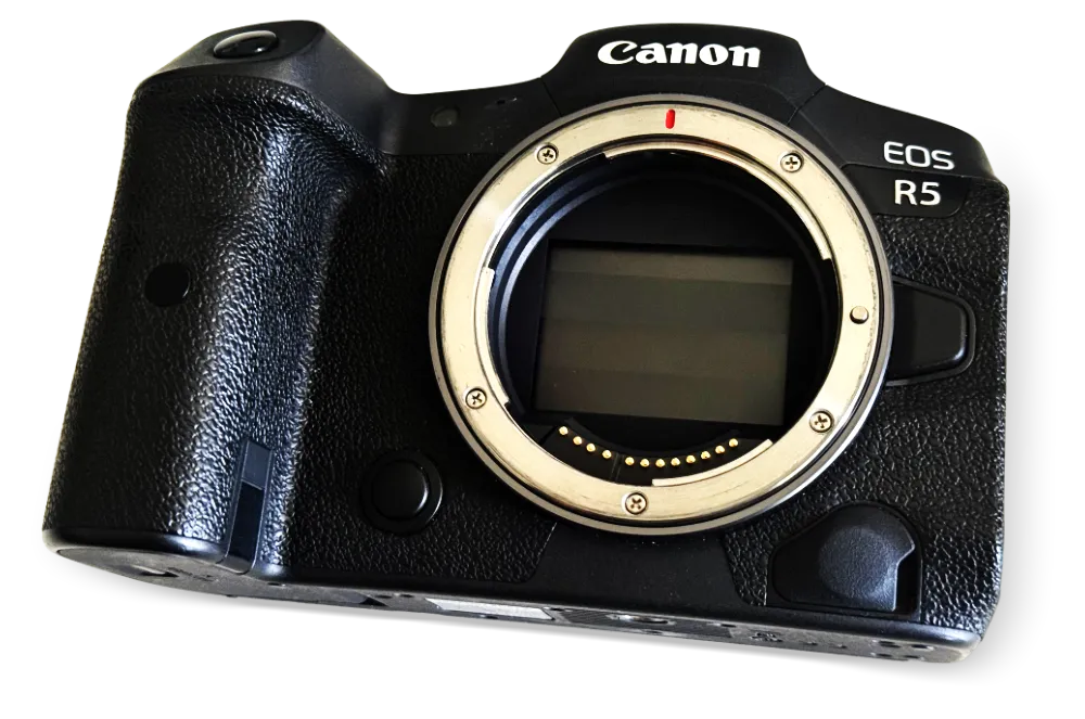 Canon EOS R5 black mirrorless camera body without lens showing sensor inside.