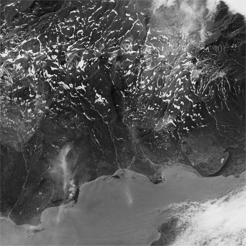 A high resolution declassified KH-7 GAMBIT spy satellite image of Severo-Kurilsk, Russia from August 16, 1964.