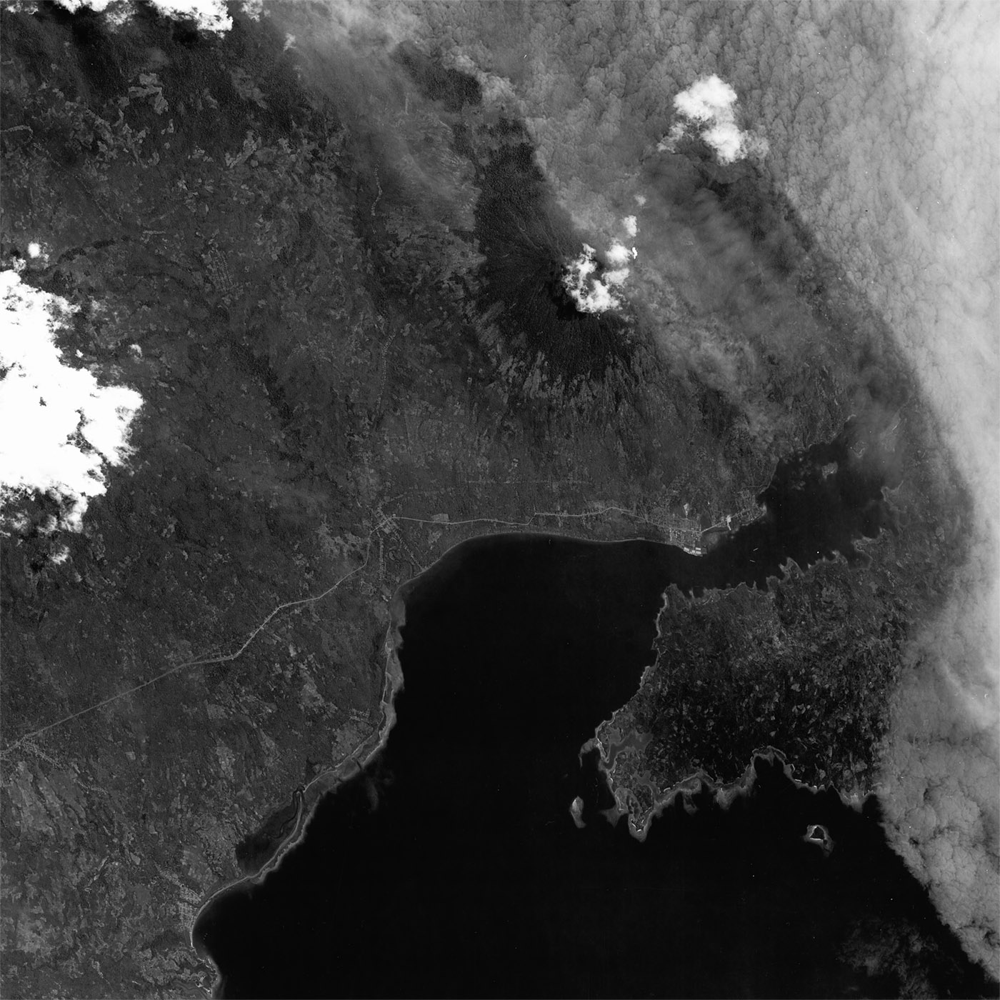 A high resolution declassified KH-7 GAMBIT spy satellite image of Bitung, Indonesia from September 24, 1964.