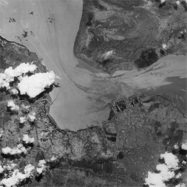 A high resolution declassified KH-7 GAMBIT spy satellite image of Surabaya, Indonesia from September 26, 1964.