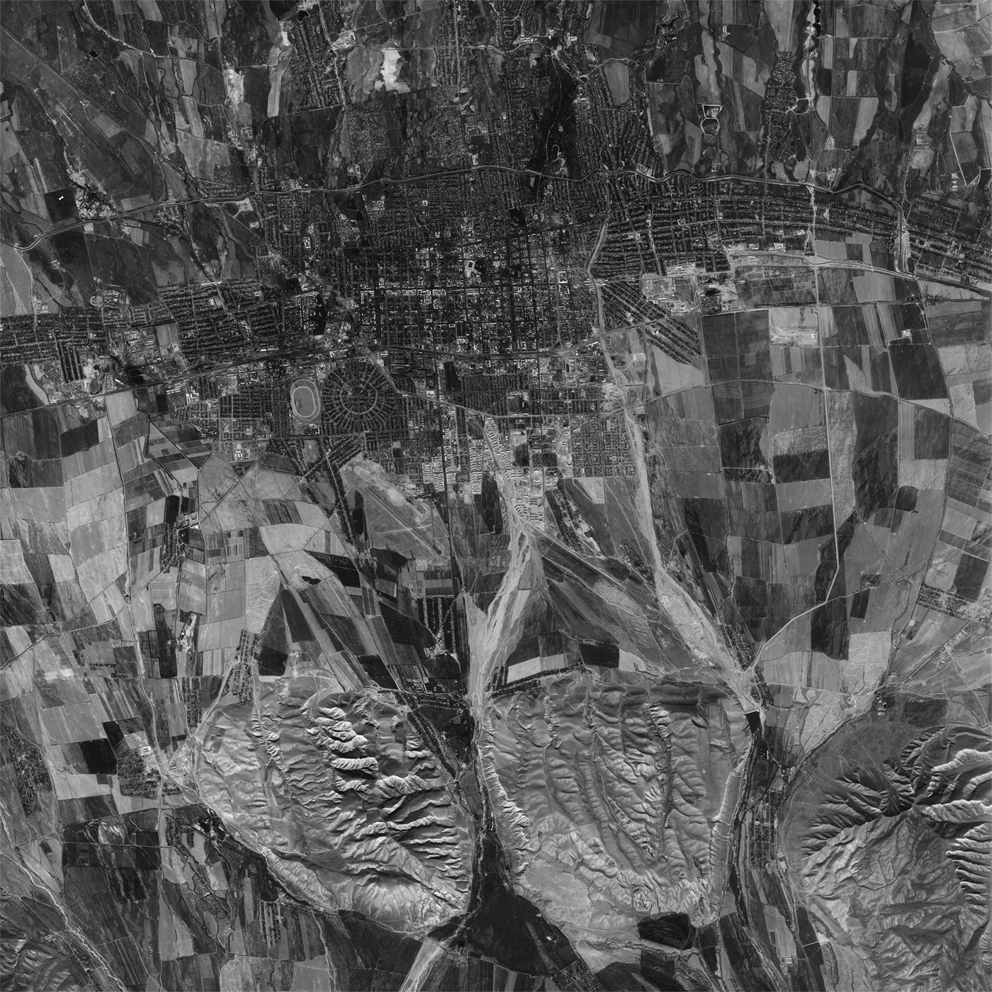 A high resolution declassified KH-7 GAMBIT spy satellite image of Bishkek, Kyrgyzstan from September 26, 1964.