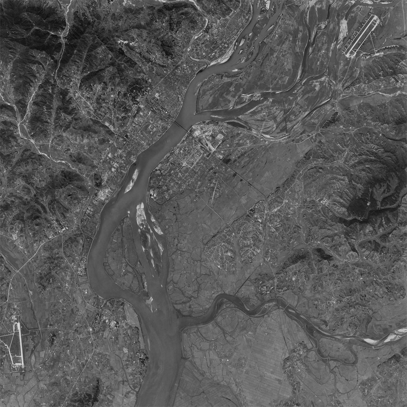 A high resolution declassified KH-7 GAMBIT spy satellite image of Yalu River, China/North Korea from September 27, 1964.