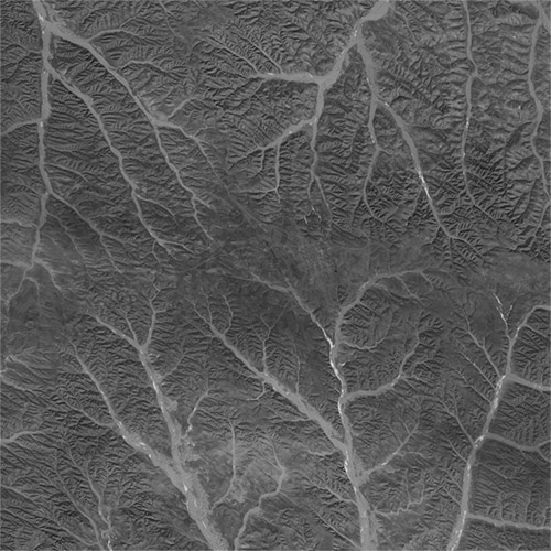 A high resolution declassified KH-7 GAMBIT spy satellite image of Dongsheng District, China from January 24, 1965.