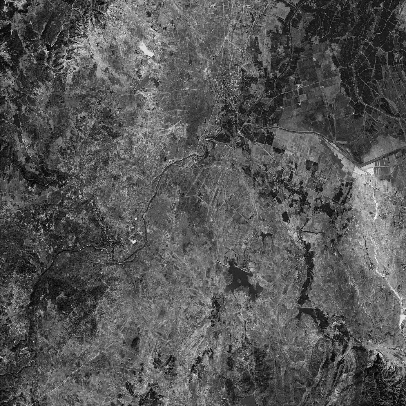 A high resolution declassified KH-7 GAMBIT spy satellite image of Luliang County, China from January 24, 1965.