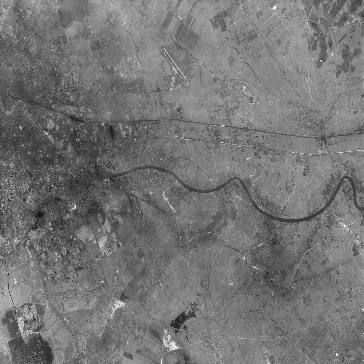 A high resolution declassified KH-7 GAMBIT spy satellite image of Tianjin, China from January 26, 1965.