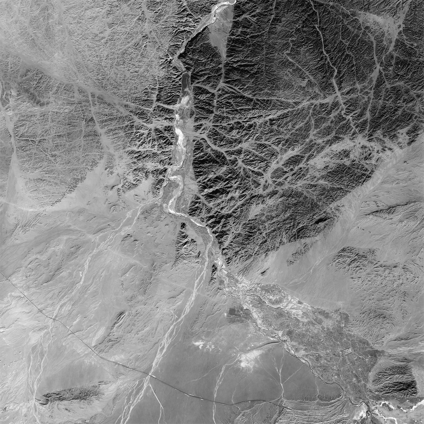 A high resolution declassified KH-7 GAMBIT spy satellite image of Yumen City, China from January 26, 1965.