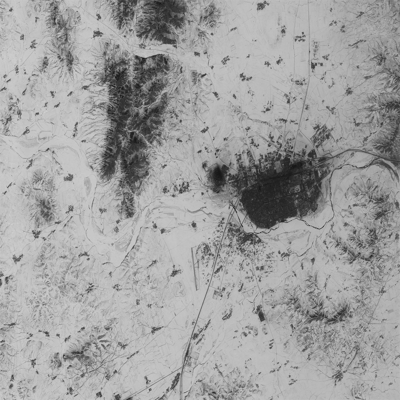 A high resolution declassified KH-7 GAMBIT spy satellite image of Jinzhou, China from January 26, 1965.