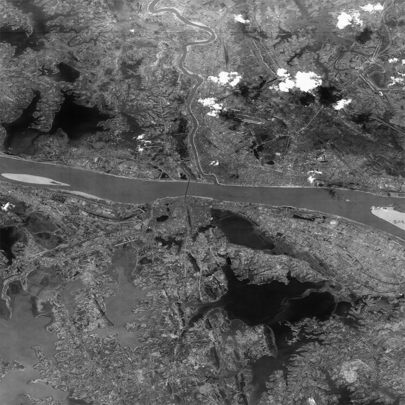 A high resolution declassified KH-7 GAMBIT spy satellite image of Wuhan, China from March 15, 1965.