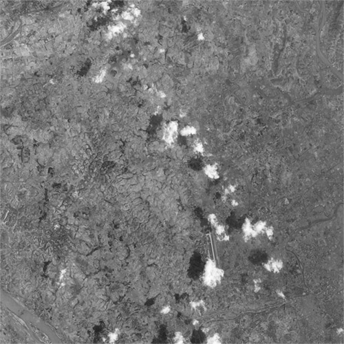 A high resolution declassified KH-7 GAMBIT spy satellite image of Guangzhou, China from March 15, 1965.