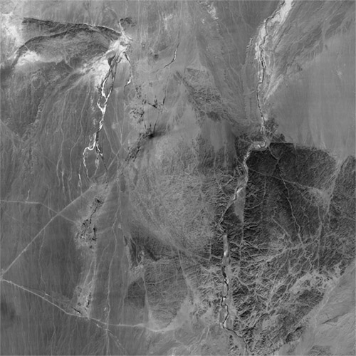 A high resolution declassified KH-7 GAMBIT spy satellite image of Yumen City, China from March 15, 1965.