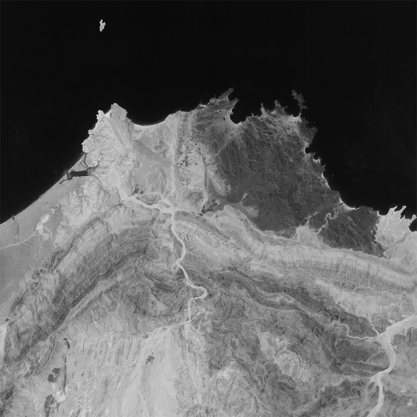A high resolution declassified KH-7 GAMBIT spy satellite image of Muscat, Oman from April 29, 1965.