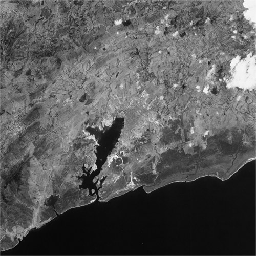 A high resolution declassified KH-7 GAMBIT spy satellite image of Santiago de Cuba, Cuba from April 29, 1965.
