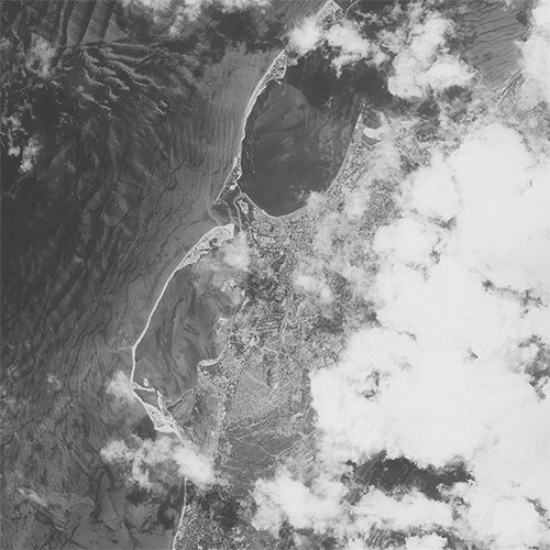 A high resolution declassified KH-7 GAMBIT spy satellite image of Luanda, Angola from April 30, 1965.