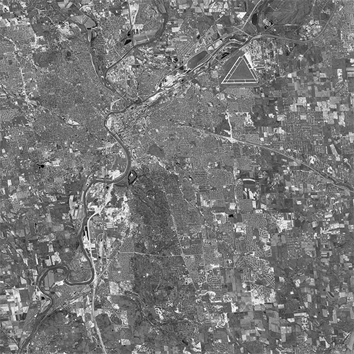 A high resolution declassified KH-7 GAMBIT spy satellite image of Dayton, USA from May 1, 1965.