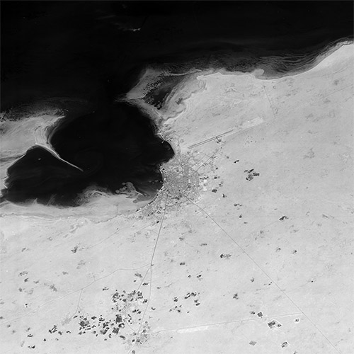 A high resolution declassified KH-7 GAMBIT spy satellite image of Doha, Qatar from May 2, 1965.