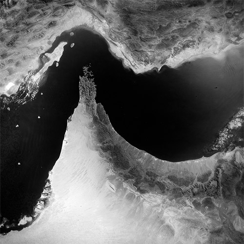 A high resolution declassified KH-5 ARGON spy satellite image of the Strait of Hormuz from June 17, 1964.