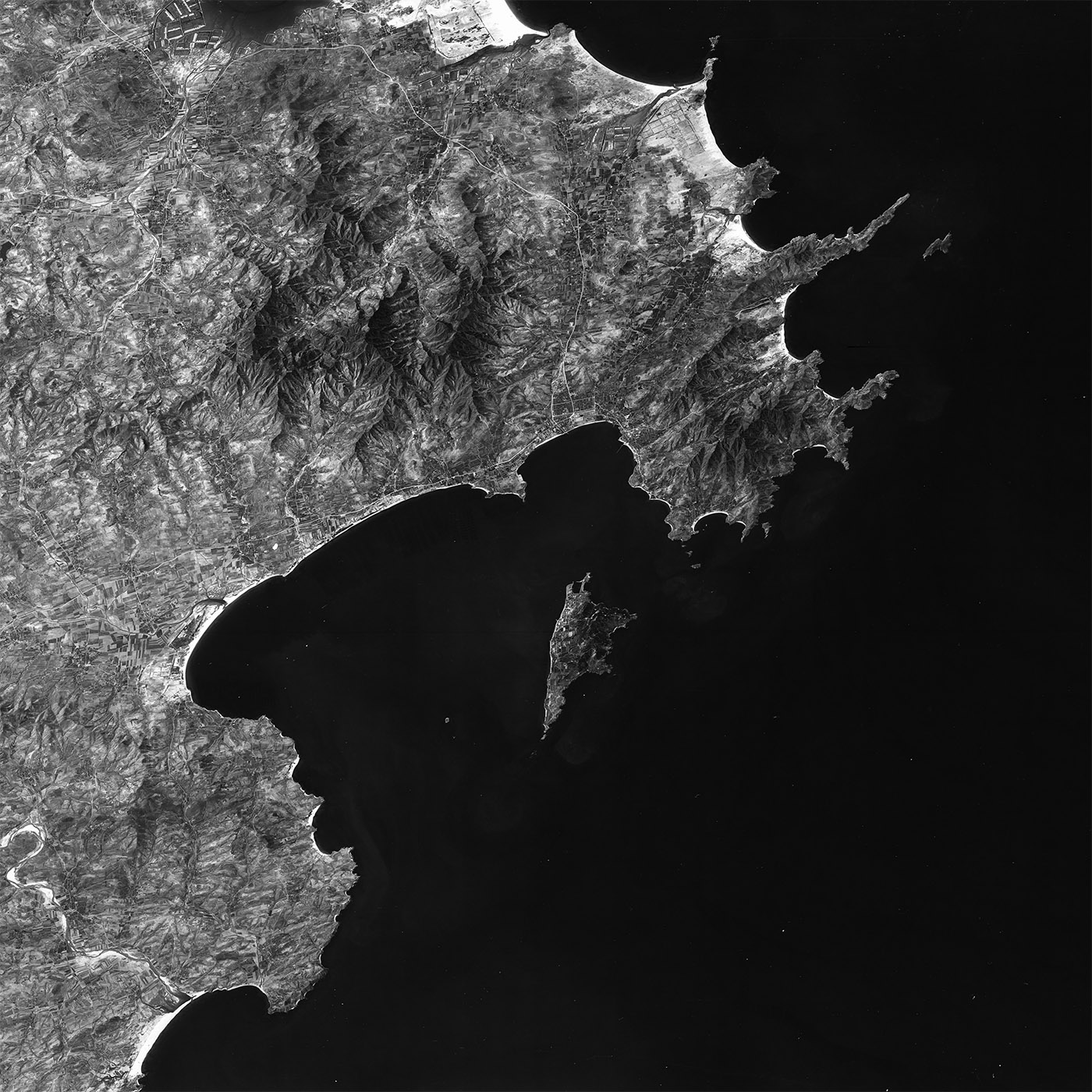 A high resolution declassified KH-7 GAMBIT spy satellite image of Weihai, China from May 3, 1965.