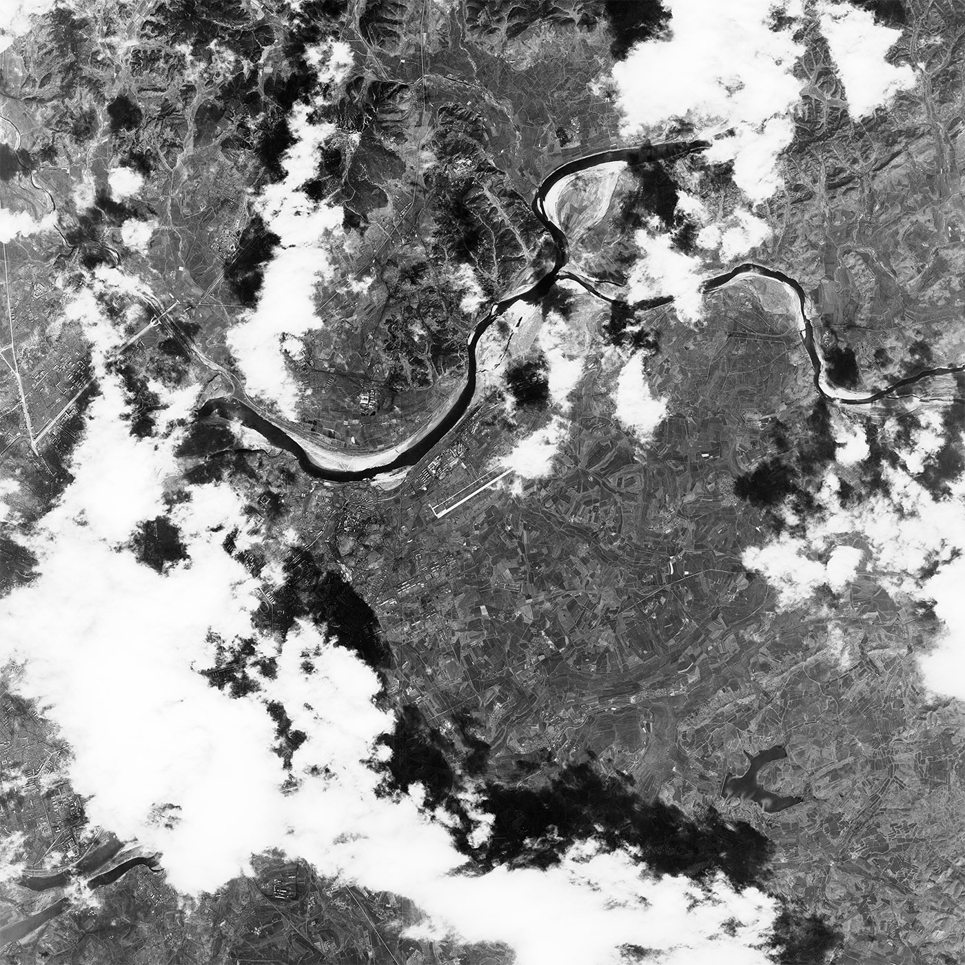 A high resolution declassified KH-7 GAMBIT spy satellite image of Pyongyang, North Korea from March 16, 1965.