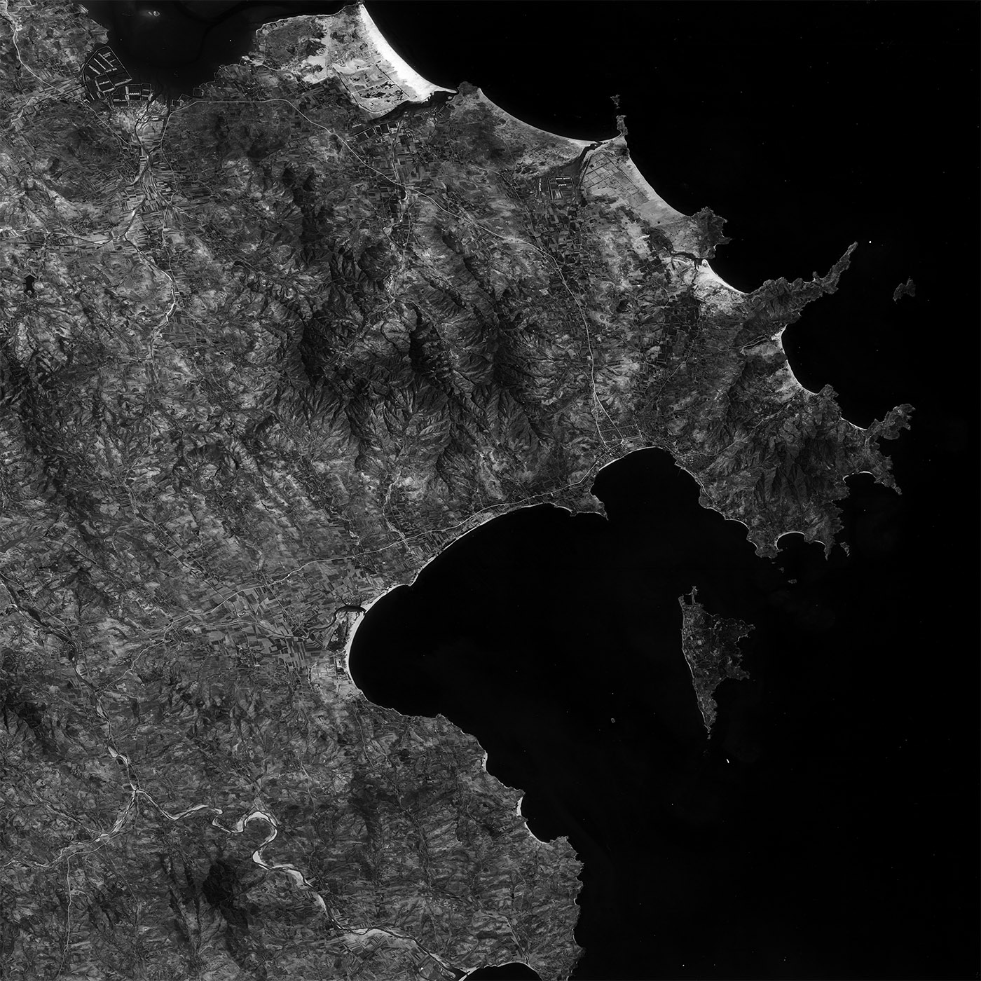 A high resolution declassified KH-7 GAMBIT spy satellite image of Weihai, China from May 3, 1965.