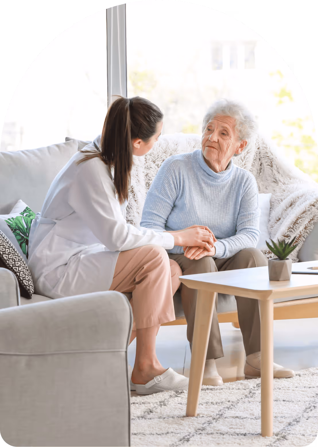 Abode image of a health professional consulting with a person