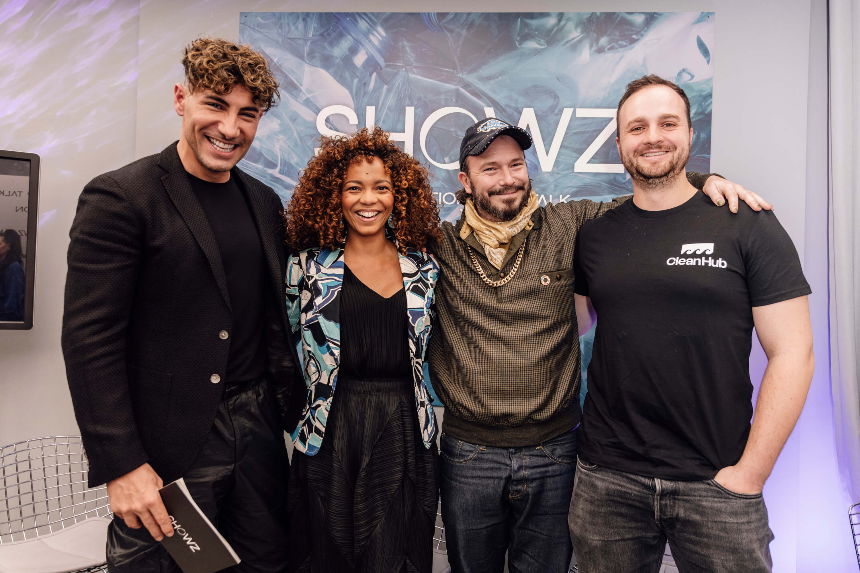 Group photo of four smiling participants at the SHOWZ innovation talk event