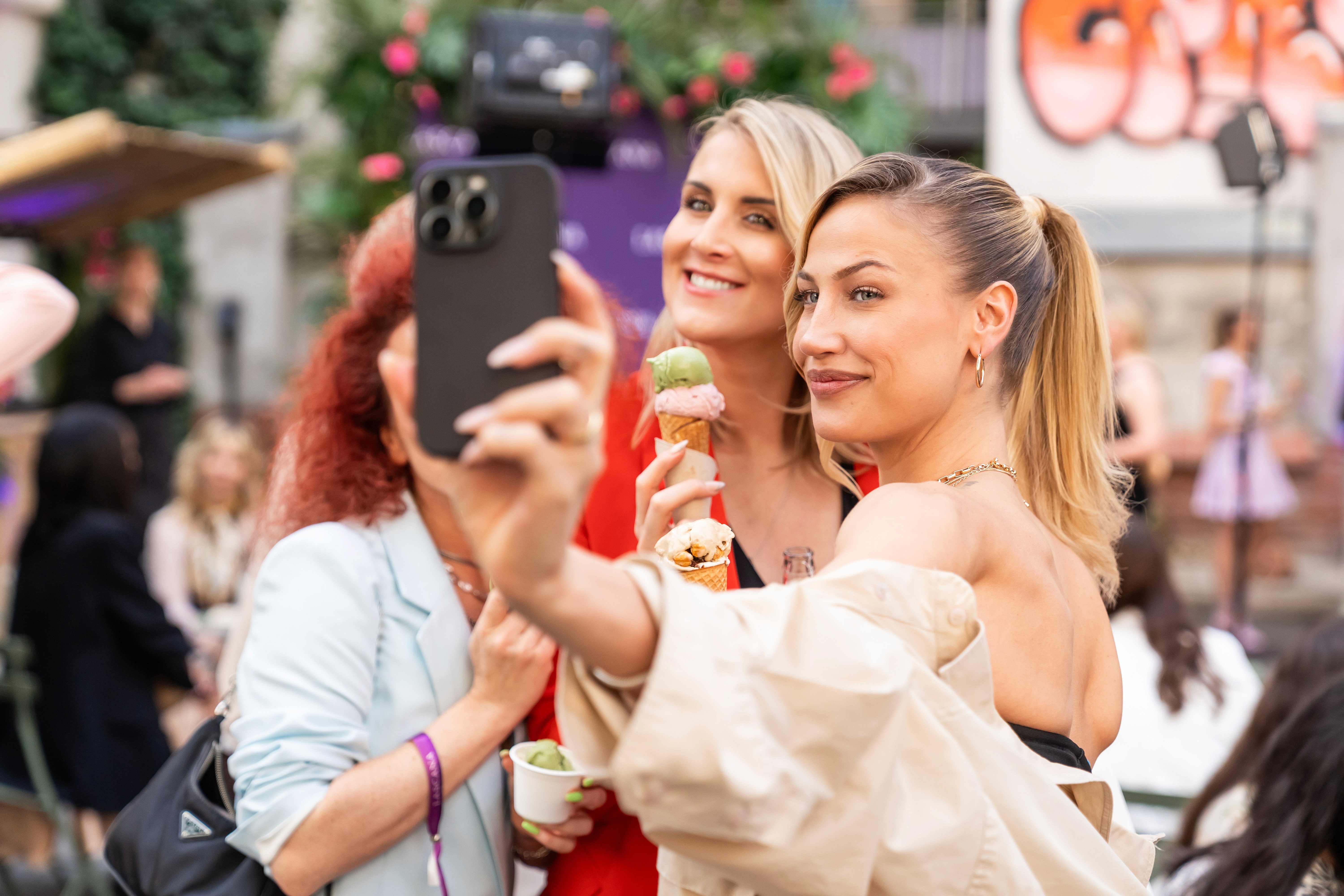 Guests taking a selfie with ice cream at the LASCANA event