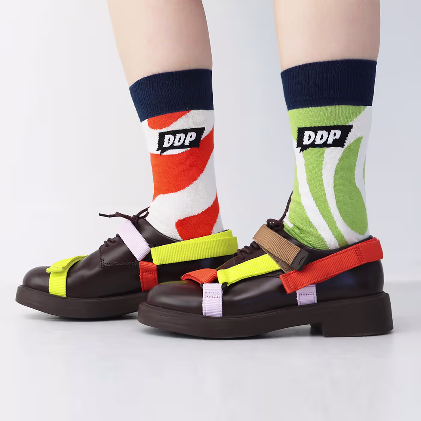 a man wearing custom dress socks in the park