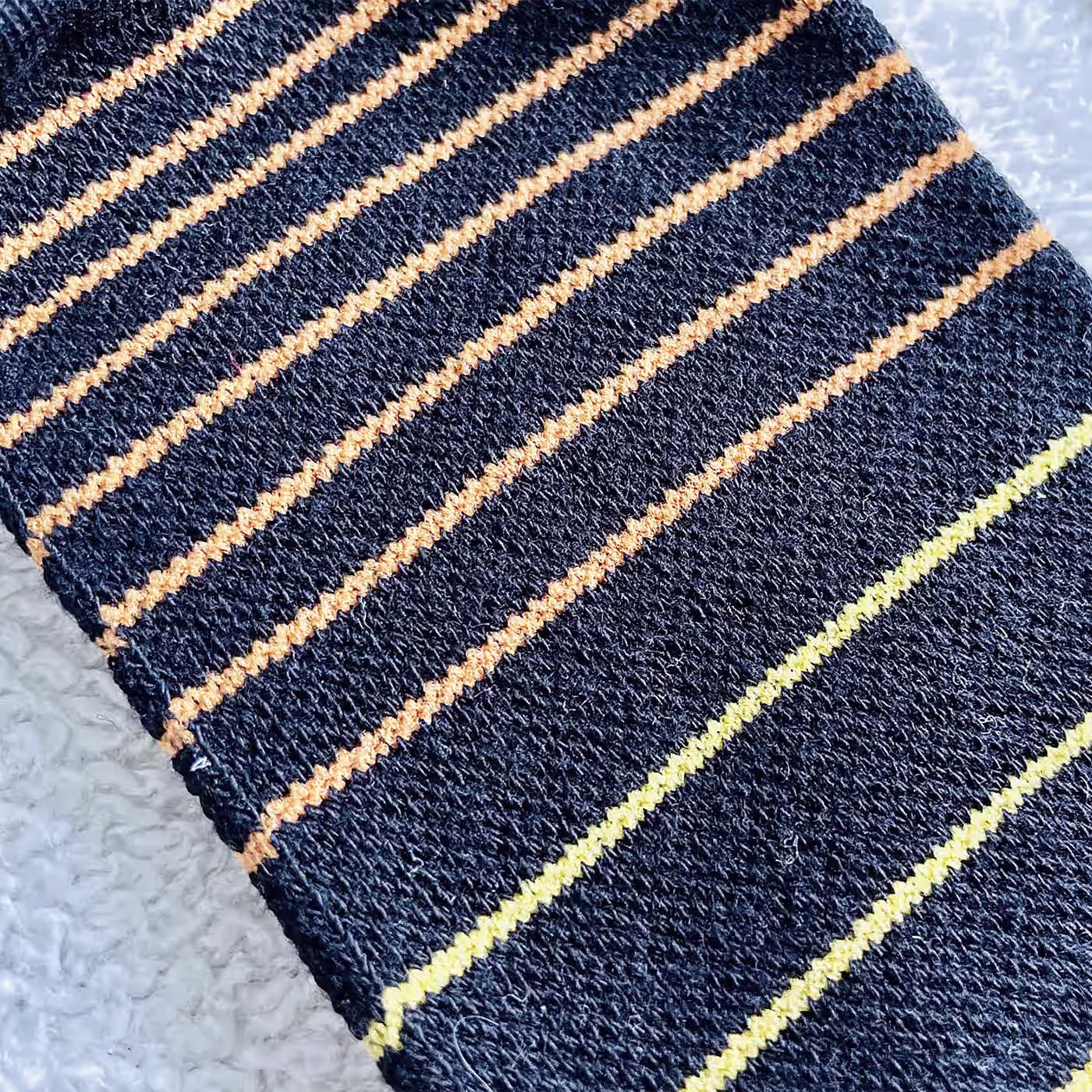 two pairs of custom dress socks, one blue and one black