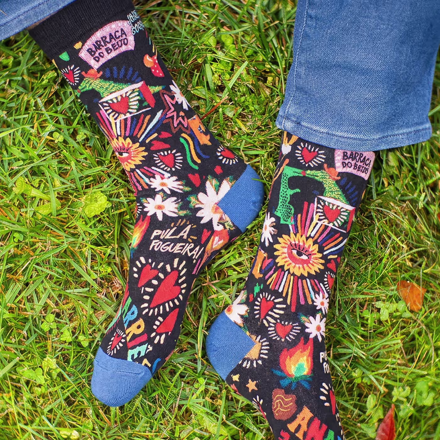 two pairs of custom dress socks, one blue and one black