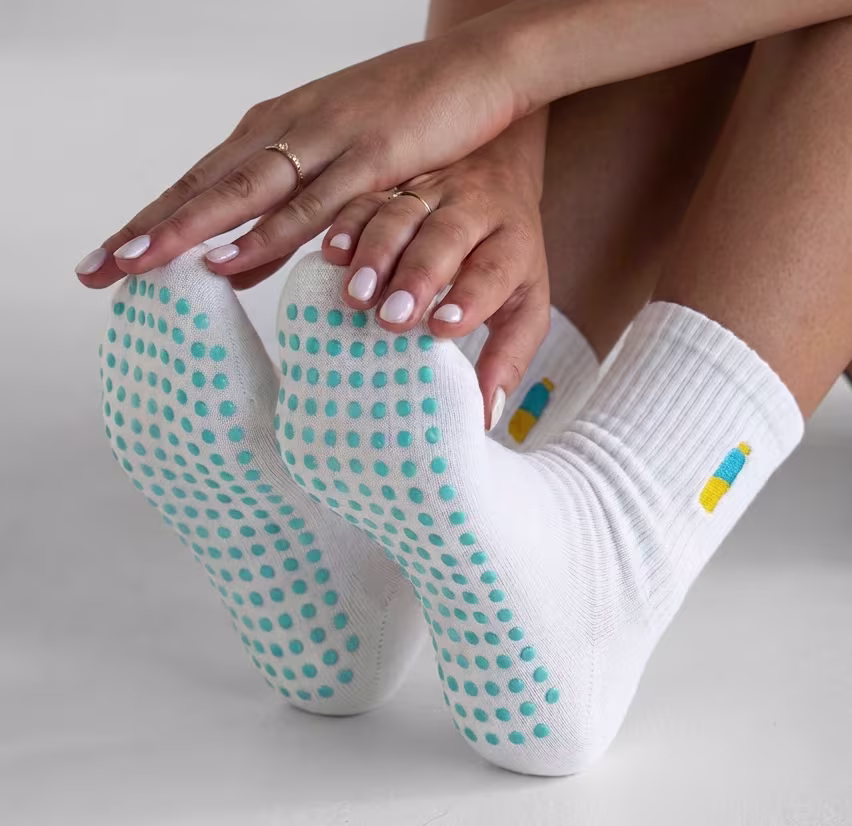 Custom sock with a branded label and badge
