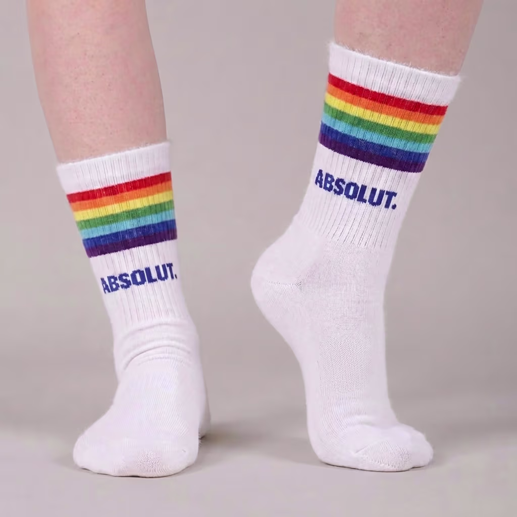 The foot of a man with premium quality green custom dress socks