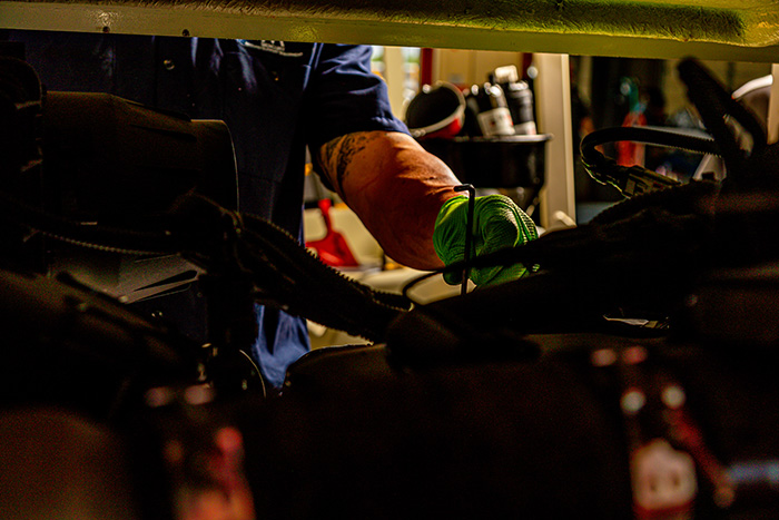 Photo of Mercury GSE team applying stickers on equipment