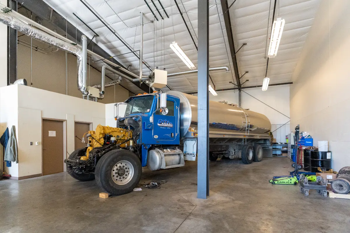 Diesel mechanic performing heavy equipment repair in Long Prairie, MN
