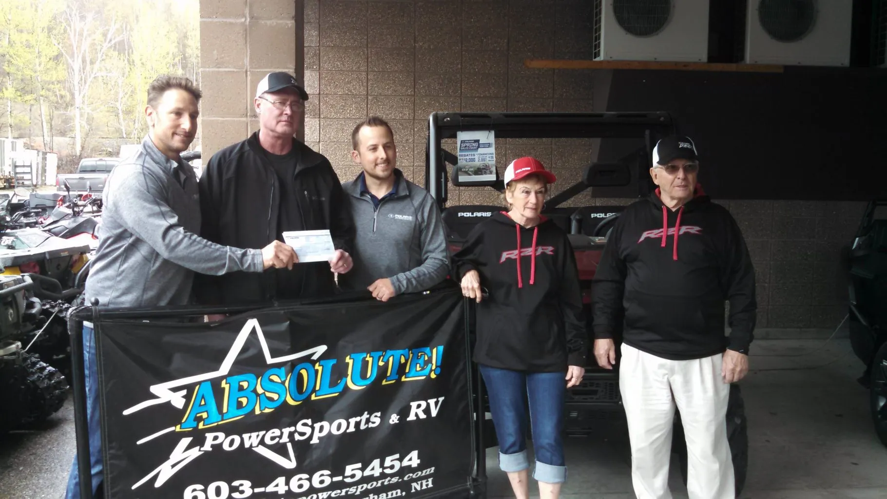 Polaris giving out a trails grant check
