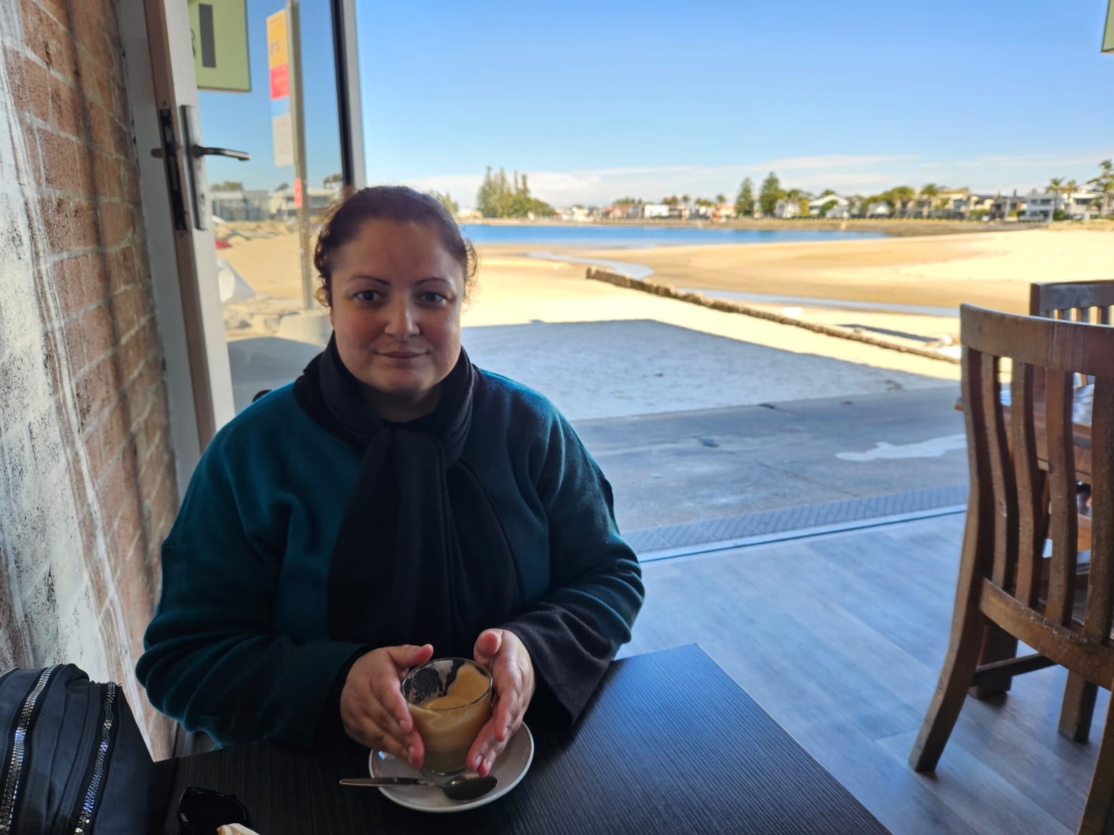 NDIS participant enjoying a meal at a Sydney waterfront