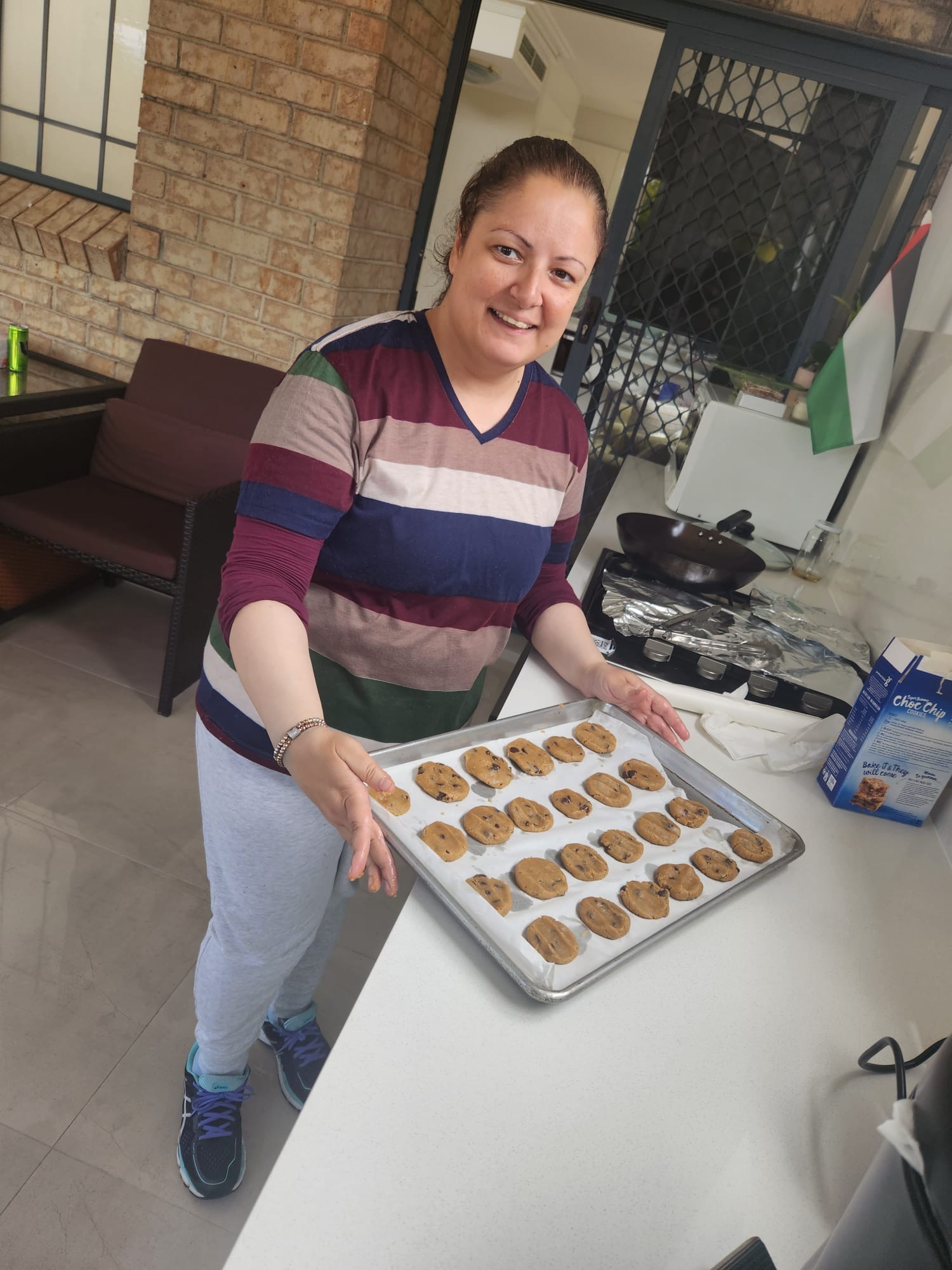 Amar cooking with Able to Thrive NDIS support in Sydney