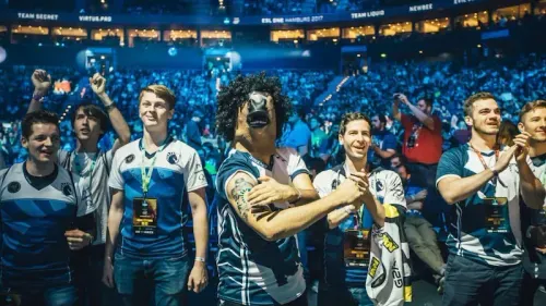 Team Liquid fans posing for the camera.