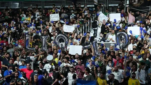 Fans cheering at an esports event.