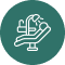 White icon of a dental chair and overhead light on a teal circular background.