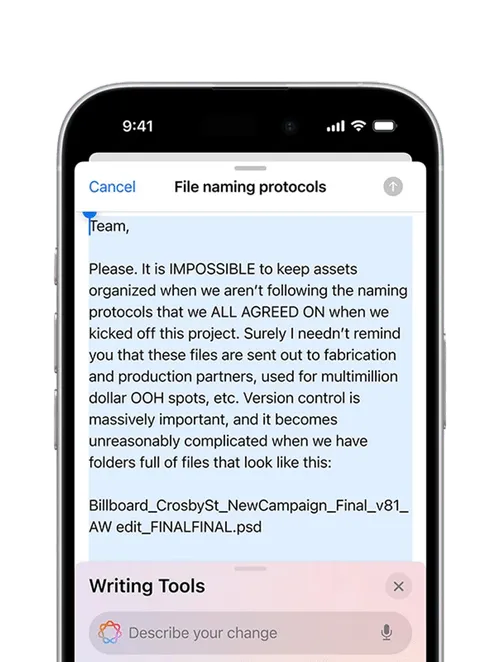 An iPhone showing AI making suggestions to an email.