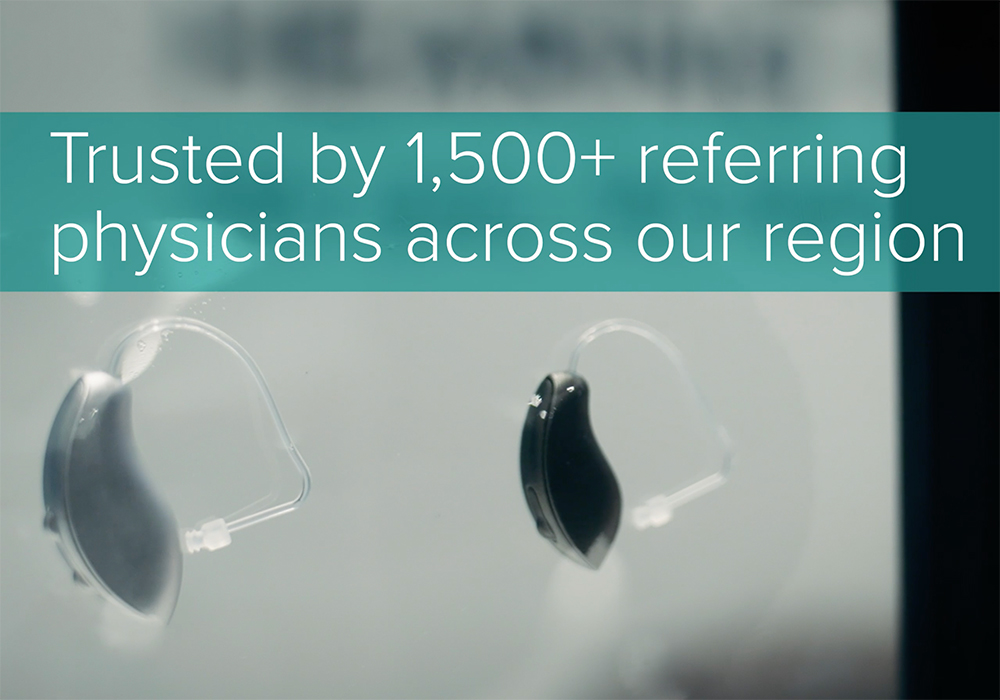 Image showing hearing aids and text describing that Live Better Hearing + Balance is trusted by 1,500+ referring physicians across the Mid-Atlantic region