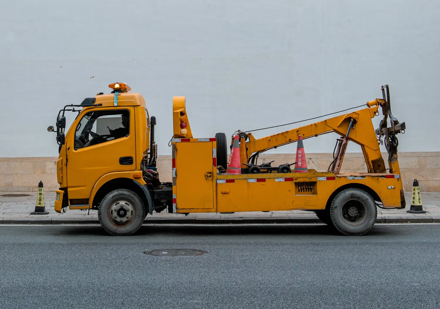 Tow truck performing towing services in Fredericksburg, Virginia