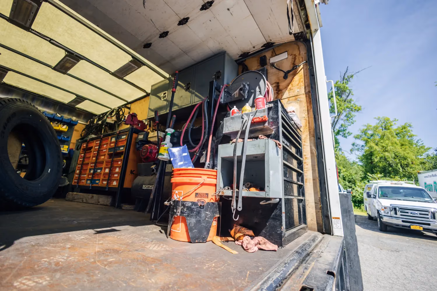 Diesel mechanic performing emergency roadside assistance services in Fredericksburg, Virginia