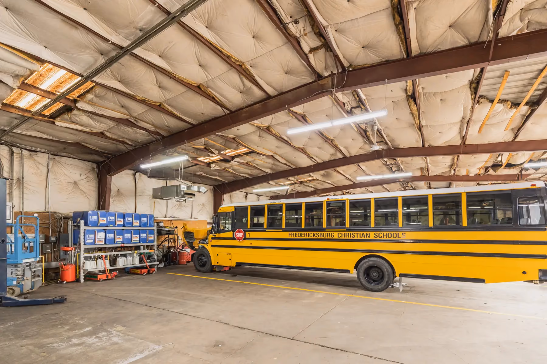 Diesel mechanic performing bus repair services in Fredericksburg, Virginia