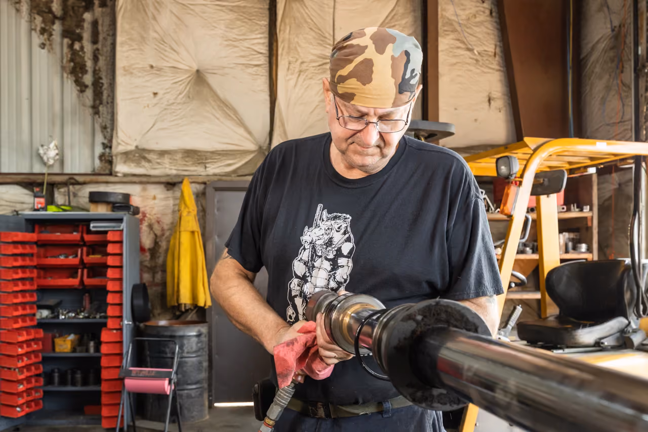 Diesel mechanic performing heavy equipment repair services in Fredericksburg, Virginia