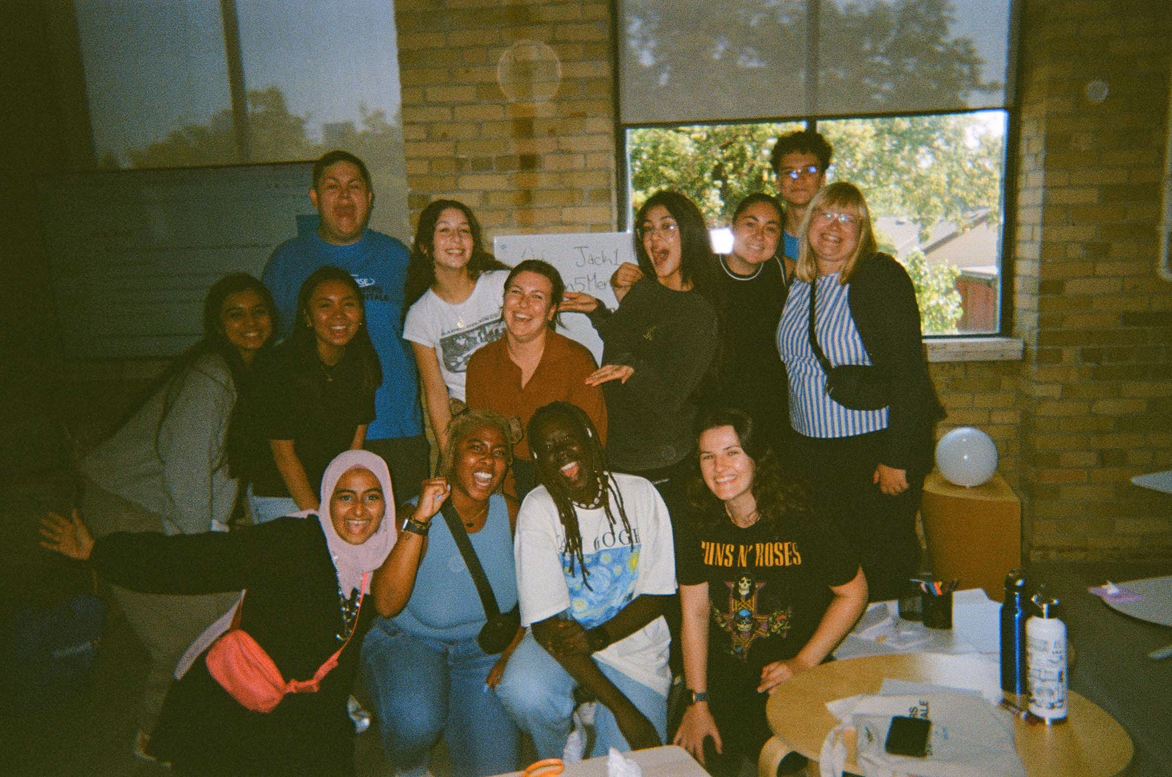 Vintage photo of participants posing in the office
